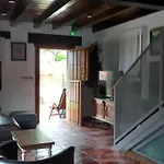 La Casa De Abajo *